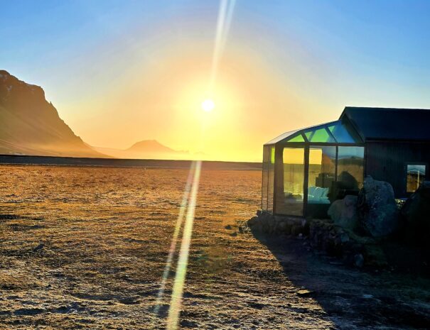 Midnight sun in Glass igloo cabins south coast Iceland