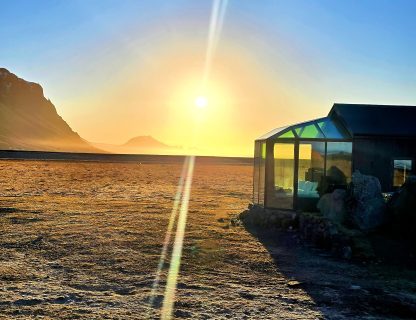 Midnight sun in Glass igloo cabins south coast Iceland